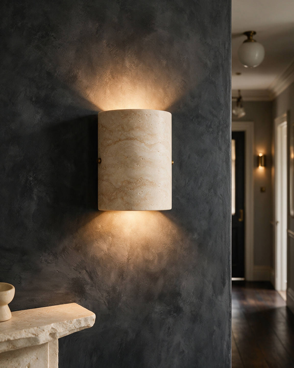 Wall light switched on in a hallway